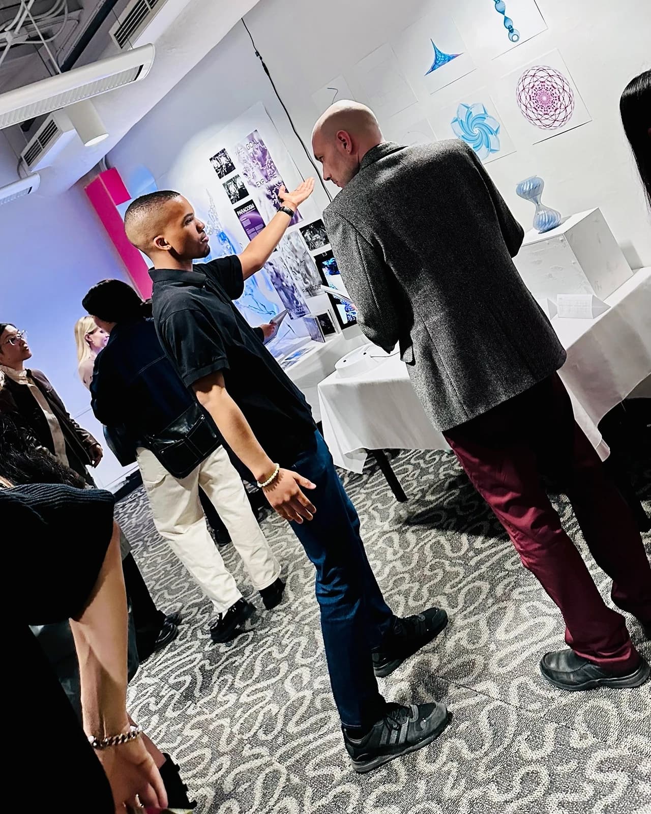 Snapshots from the opening night of GradEx 111 (view 2 of 3).